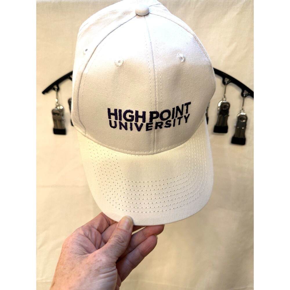 Brand new High Point University white baseball hat with purple stitching